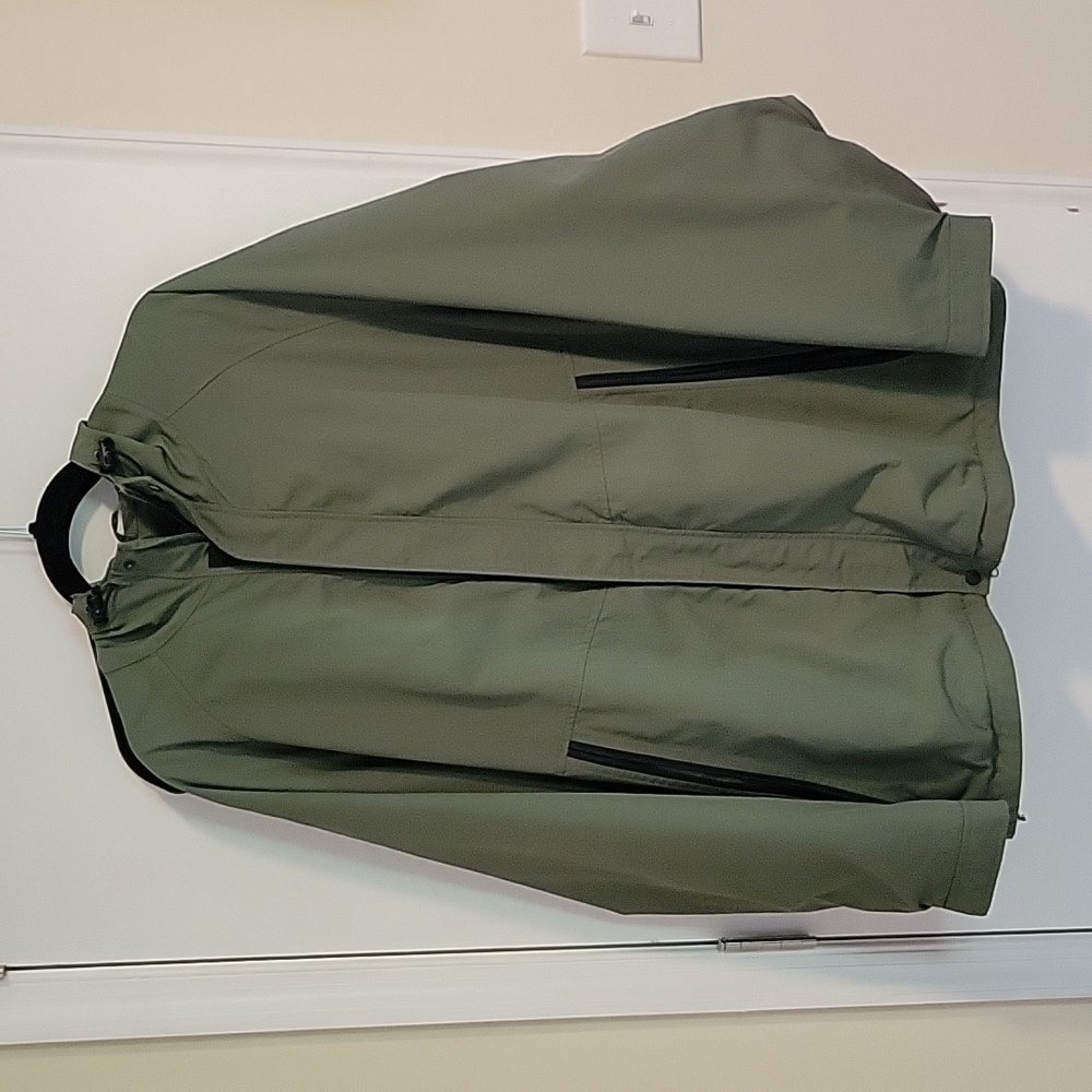 Woolrich light rain jackets with zipper snaps and velcro closure